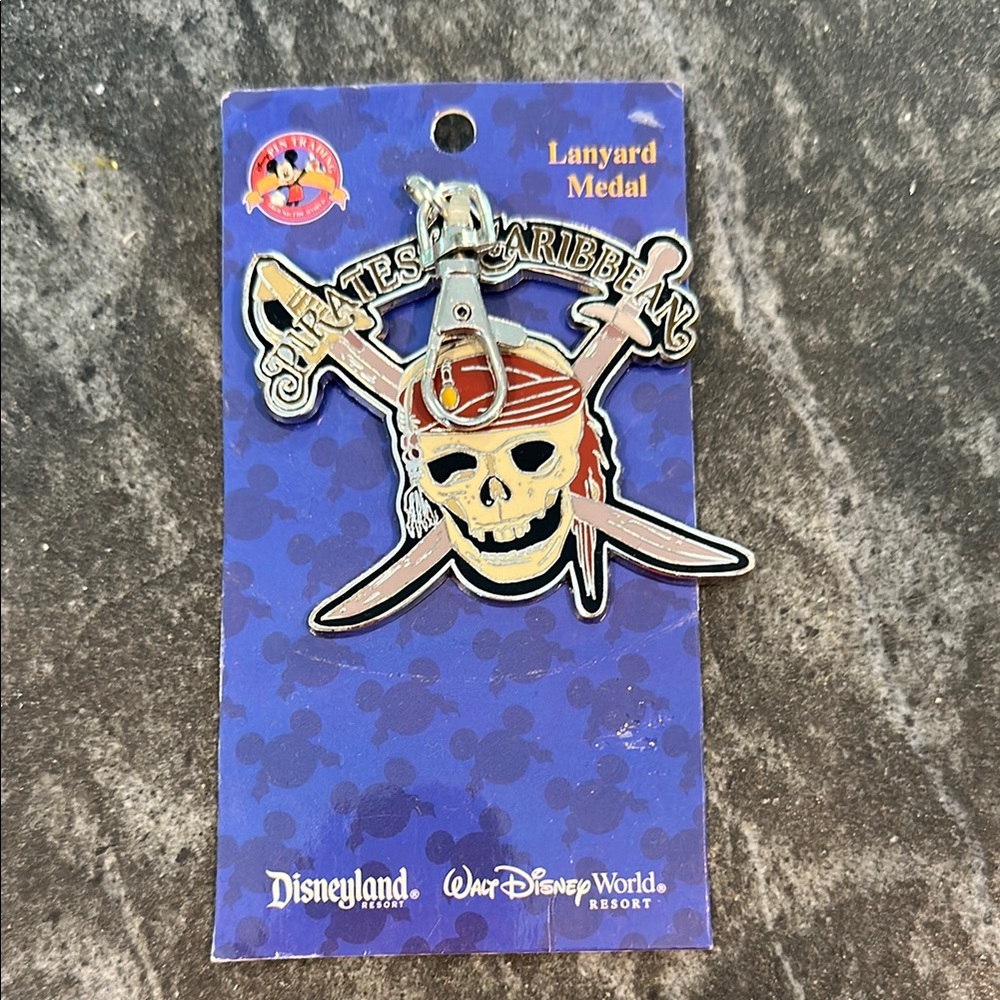 Disney Pirates of the Caribbean Skull Lanyard Medal - Red and Silver
